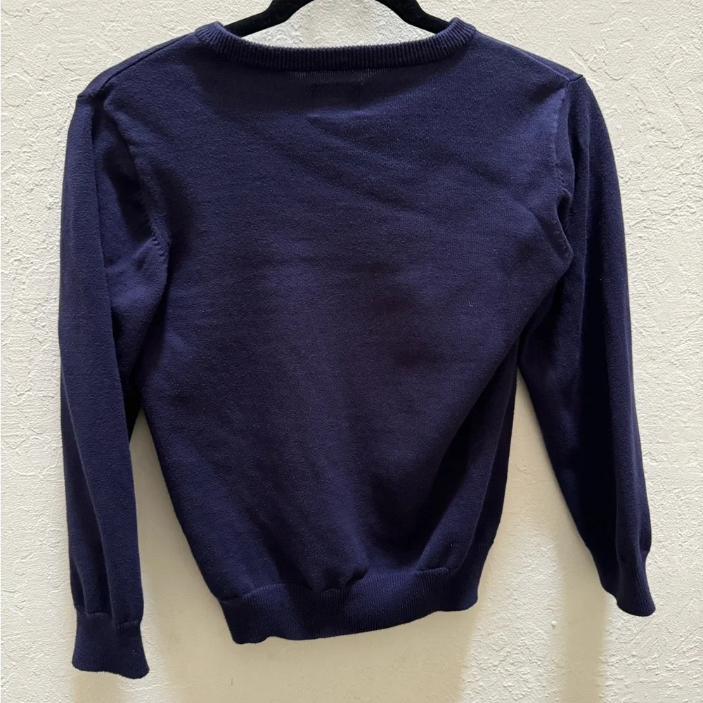 Gently used boys sweater. Blue v neck sweater. Boys size 7/8.